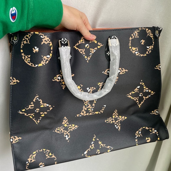 Louis Vuitton Jungle Tote - Picture 2 of 12